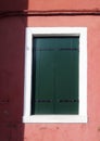 Window with green shutters Royalty Free Stock Photo