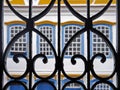 Window grid detail and colonial facade, Sao Joao del Rei, Brazil Royalty Free Stock Photo