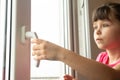 Window handle lock. Key locking window with key for kids safety.
