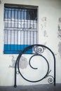 Window on a Havana street with rod iron bars