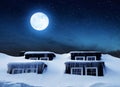 Window with icicles and snow cover on the roof in the night sky with moon.