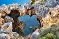 Coastal Imestone formation looking like a maw with teeth Royalty Free Stock Photo