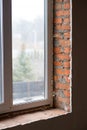 Window is installed in a new unfinished house Royalty Free Stock Photo