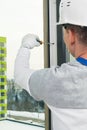 The window installer docks the window frames