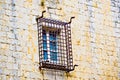 Window with iron bars on stone eall Royalty Free Stock Photo