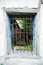 A window with an iron grating Royalty Free Stock Photo