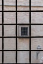 Window with iron grating Royalty Free Stock Photo