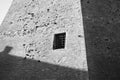 A window with iron gratings in a medieval prison Italy, Europe Royalty Free Stock Photo