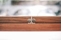 Window latch handle for open and lock the wooden window. Royalty Free Stock Photo