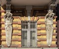 Window with lattice and caryatids