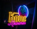 A fluorescent sign in the window of King Kone, in Chardon, Ohio