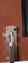 Window lock wood, lock with screw lock view. Royalty Free Stock Photo