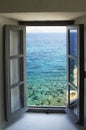 Window looking out on the sea Royalty Free Stock Photo