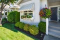 Window and main entrance of residential house with door steps on sunny day