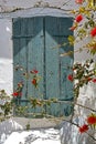 Window of the medieval house with flowers Royalty Free Stock Photo