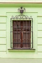 Window with metal security bars