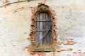 Window of an old abandoned church boarded up with wooden boards Royalty Free Stock Photo