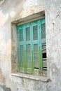 Window of an old apartment building in Malia. Royalty Free Stock Photo