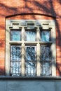 Window in an old building made of red bricks Royalty Free Stock Photo