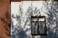 A window of old building on a white wall. Royalty Free Stock Photo