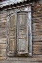 Window of an old russian house decorated with wood carving