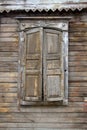 Window of an old russian house decorated with wood carving
