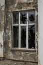 A window in an old house. Broken glass. Royalty Free Stock Photo