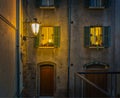 Window in an old house decorated with flower at night