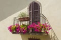 Window in an old house decorated with flower