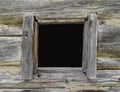 Window in an old log cabin. Royalty Free Stock Photo