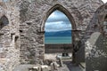 Monastary Window with ocean and mountain Royalty Free Stock Photo
