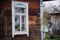 Window of old wooden house in village. Countryside background. Landscape photoshot Royalty Free Stock Photo