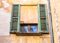 Window with old wooden shutter. Royalty Free Stock Photo