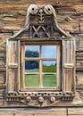 Window in an old wooden village house Royalty Free Stock Photo