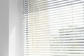 Window with open modern horizontal blinds indoors Royalty Free Stock Photo