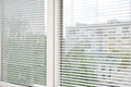 Window with open modern horizontal blinds indoors Royalty Free Stock Photo
