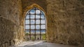 The window opening in the ancient Citadel of Qaitbay is barred. Royalty Free Stock Photo