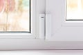 window opening sensor hanging on the window, home alarm system, home protection