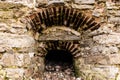 Window opening in a stone wall.