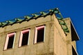 window openings in poured concrete wall at construction stage. pink foam insulation around the edges Royalty Free Stock Photo