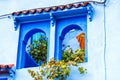 Window overlooking the vineyard, Chefchaouen, Morocco. With selective focus Royalty Free Stock Photo