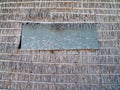 Window panel on thatch wall Royalty Free Stock Photo