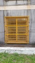 window with patched yellow grid