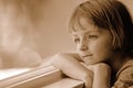 Window Portrait of Little Girl Looking Out Royalty Free Stock Photo