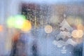 Window rain blurred city lights Royalty Free Stock Photo