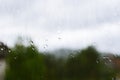 Window with rain drops with wiev on a forest Royalty Free Stock Photo