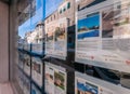 Window of a real estate agency closed