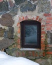 window reflecting the winter view, old window in vintage style Royalty Free Stock Photo