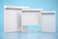 Window roller shutters of different size on blue background