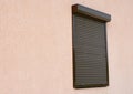 Window with rolling shutter and copy space. Window with rolling shutter for house protection.